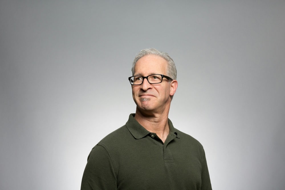 Original avatar image showing a adult with glasses against a white background